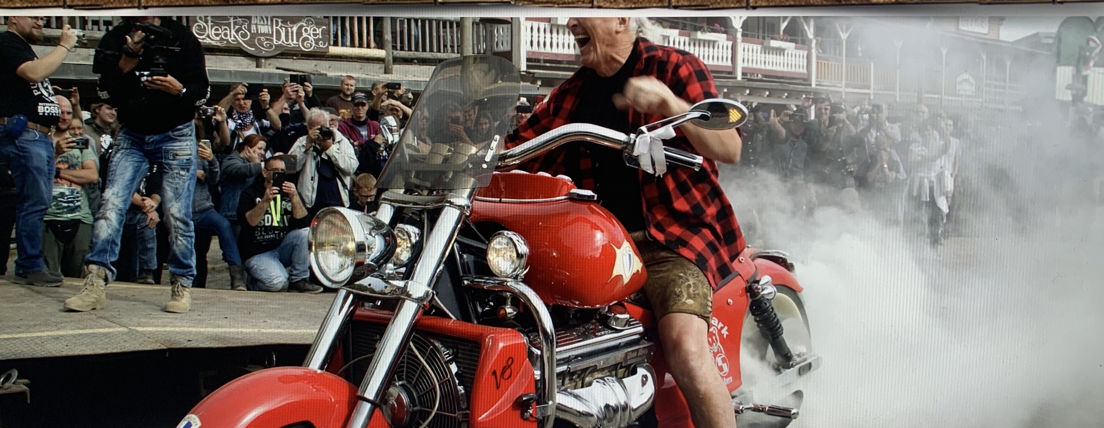 21. INT. BOSS HOSS MOTORCYCLE MEETING